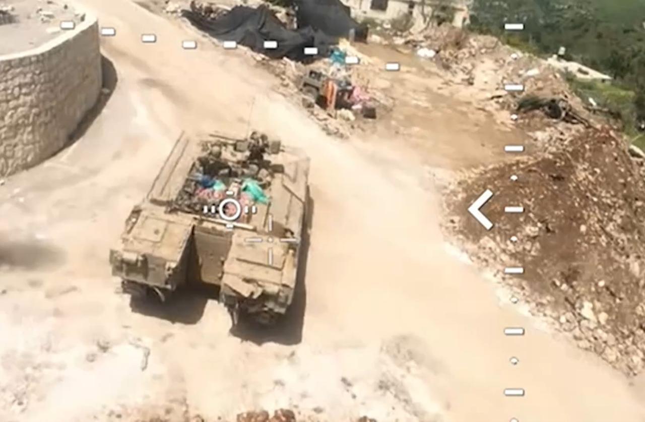 The photo shows an Israeli Namer armored personnel carrier (APC) from Hezbollah's FPV drone's POV in southern Lebanon at an unspecified time. (Photo via Telegram)