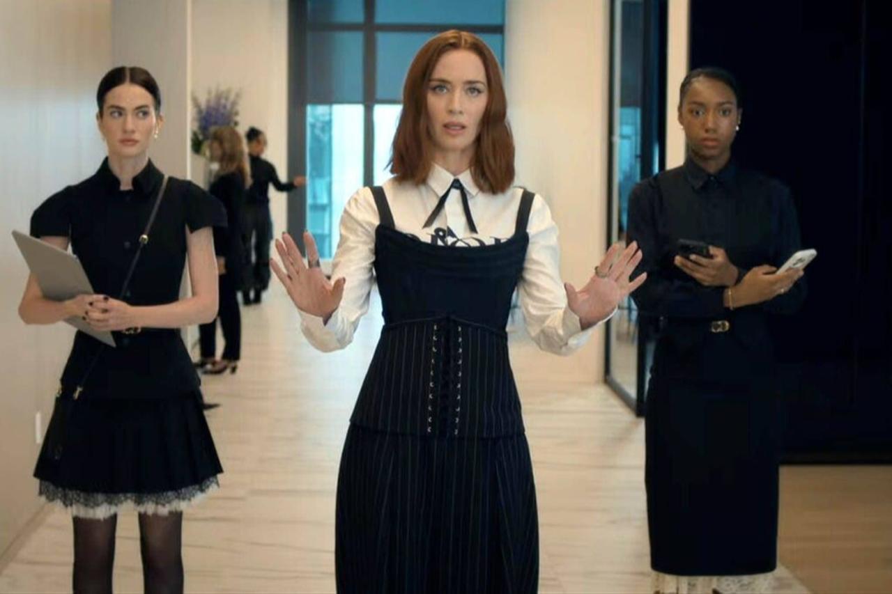 Emily Charlton stands inside a fashion office in a scene from "The Devil Wears Prada 2," accessed on May 2, 2026. (Courtesy of IMDb)