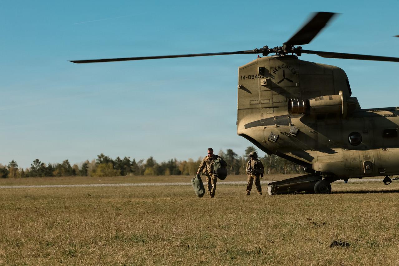 A U.S. Army Soldier exits a CH-47 Chinook during exercise Combined Resolve 26-07 at 7th Army Training Command’s Grafenwoehr Training Area, Germany, April 23, 2026. (Photo via U.S. Army)