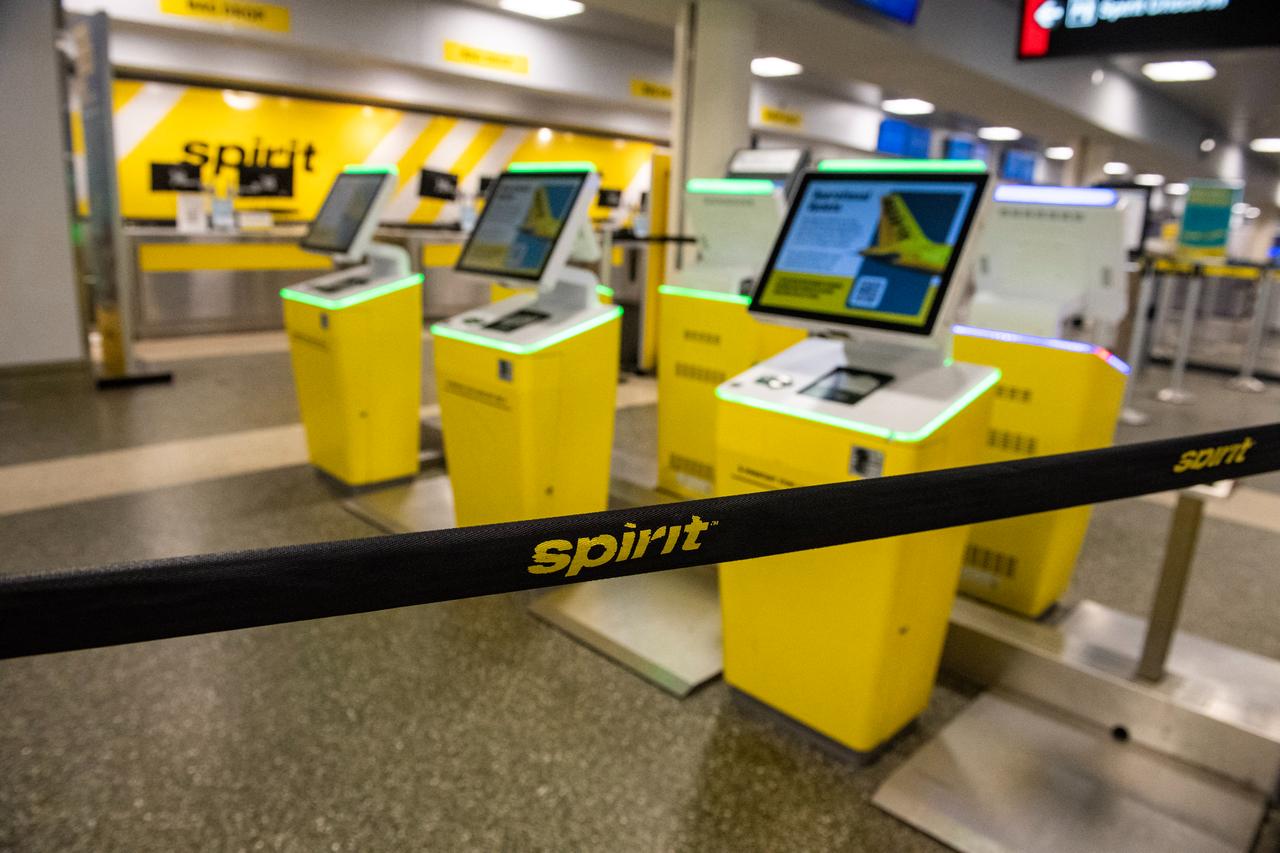 The bag drop and customer service counters at the departures terminal for Spirit airlines sit empty as operations ceased for the company at Logan Airport in Boston, Massachusetts, US, May 2, 2026. (AFP Photo)