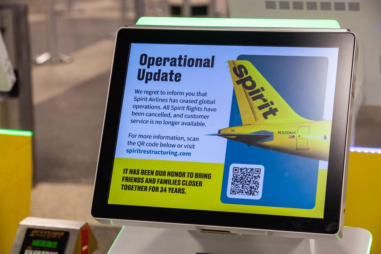 The bag drop and customer service counters at the departures terminal for Spirit airlines sit empty as operations ceased for the company at Logan Airport in Boston, Massachusetts, US, May 2, 2026. (AFP Photo)