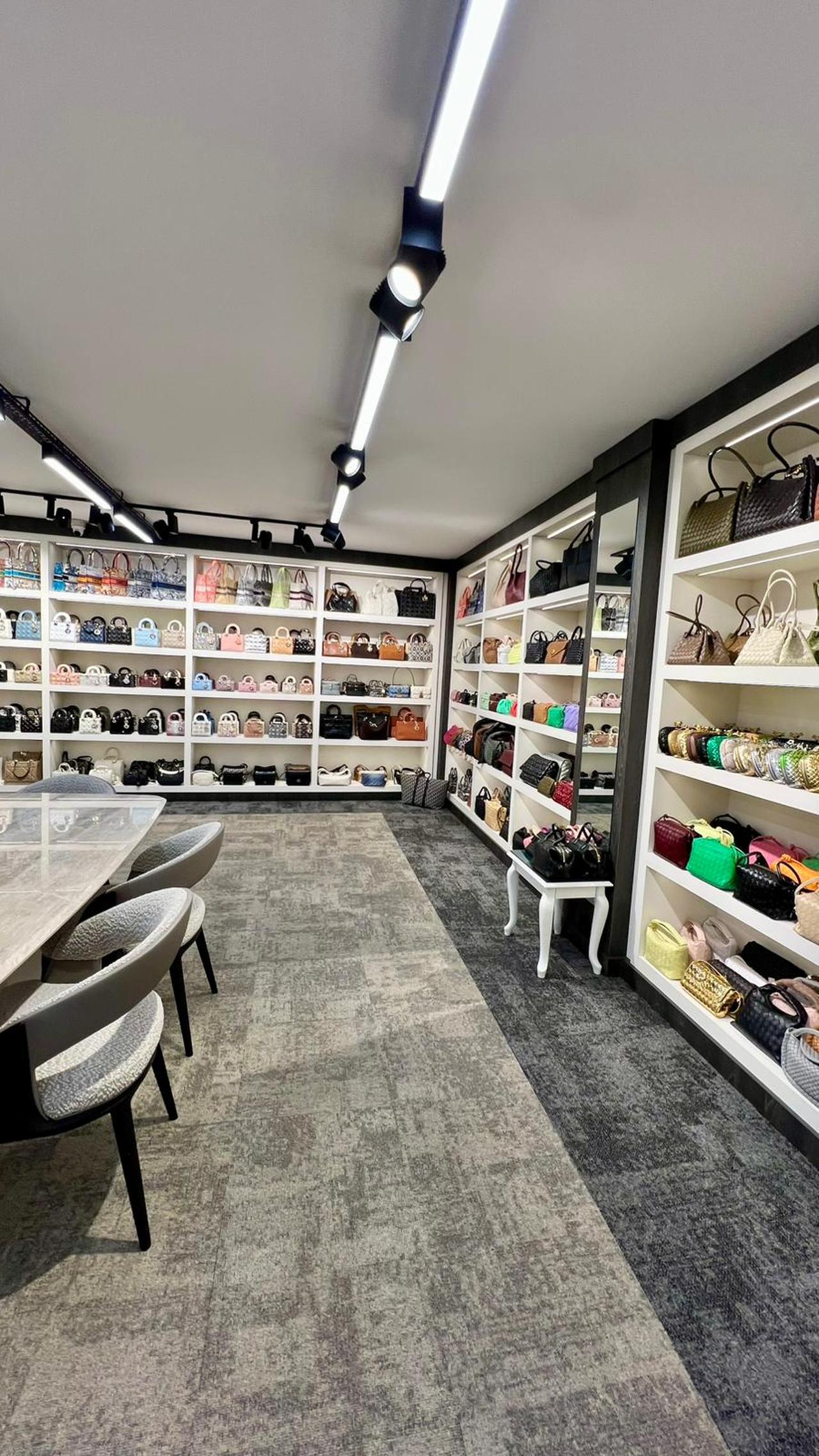 Rows of high-grade replica handbags displayed inside a private showroom in Karakoy, where influencers, tourists, and wealthy clients search for near-identical versions of luxury designs. (Photo by Türkiye Today)