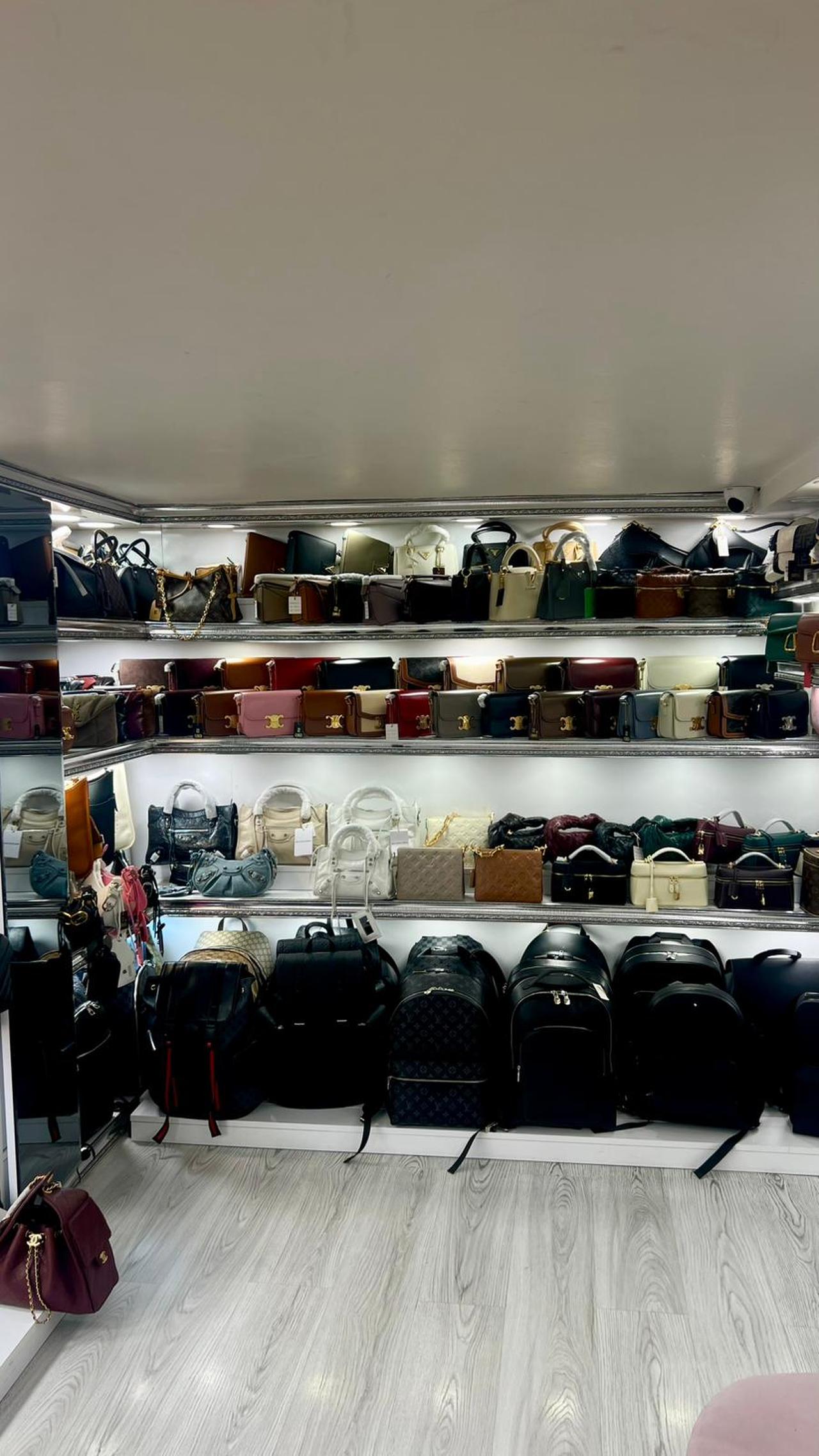 Stacked tightly beside one another, these mass-produced replicas target tourists and budget buyers searching for accessible versions of luxury fashion. (Photo by Türkiye Today)