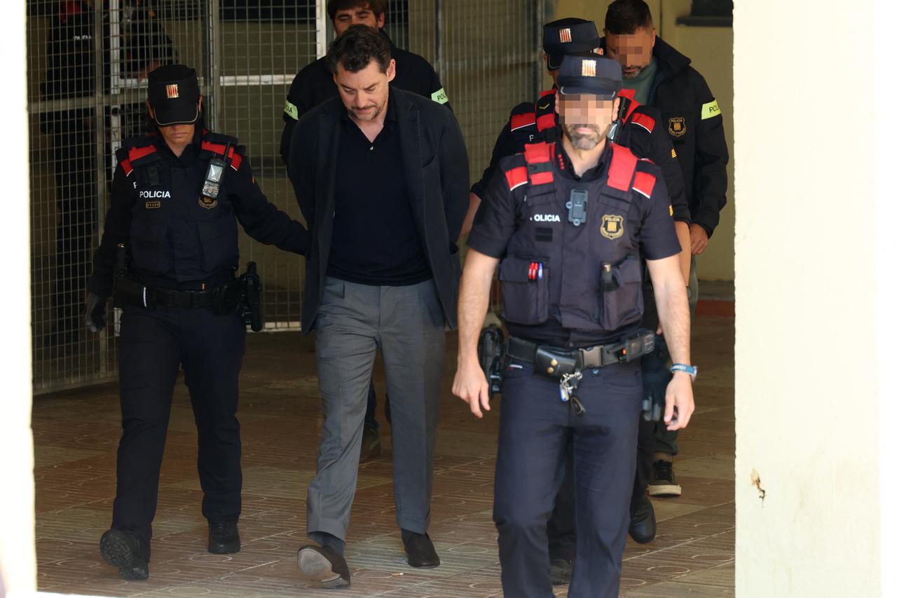 Jonathan Andic, the son of Mango founder Isak Andic, is escorted by Catalonia’s regional police force, Martorell, near Barcelona, May 19, 2026. (AFP Photo)