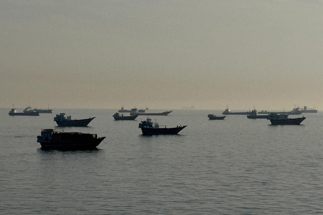 Vessels are seen anchored in the Strait of Hormuz, off the port city of Khasab on Oman’s northern Musandam Peninsula on May 17, 2026. (AFP Photo)