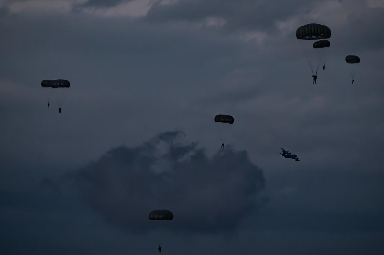 Paratroopers parachute as they take part in the Trojan Footprint 2026 (TFP26) military exercise in New Peramos on May 16, 2026. (AFP Photo)