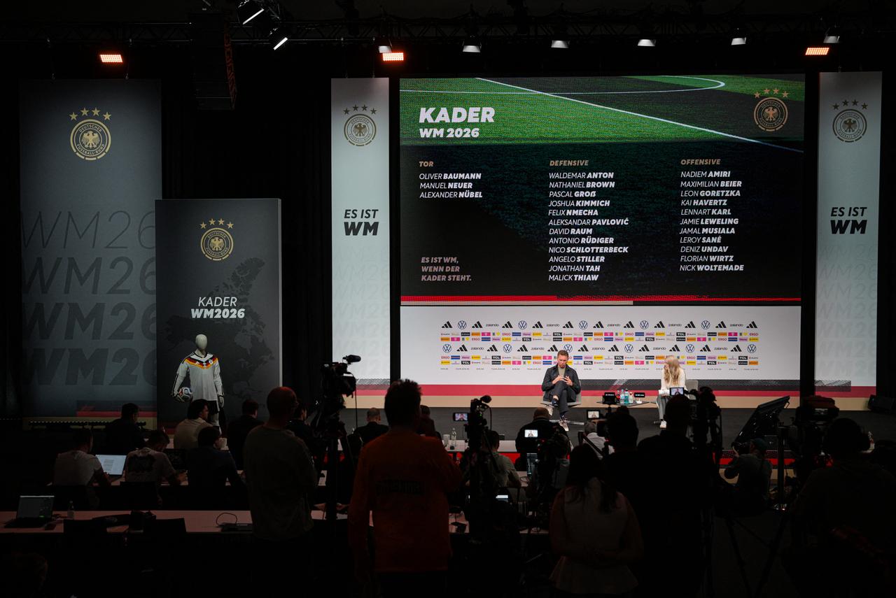 Germany's head coach Julian Nagelsmann (on stage L) addresses a press conference to announce the German squad for the 2026 World Cup, on May 21, 2026 in Frankfurt am Main, western Germany. (AFP Photo)
