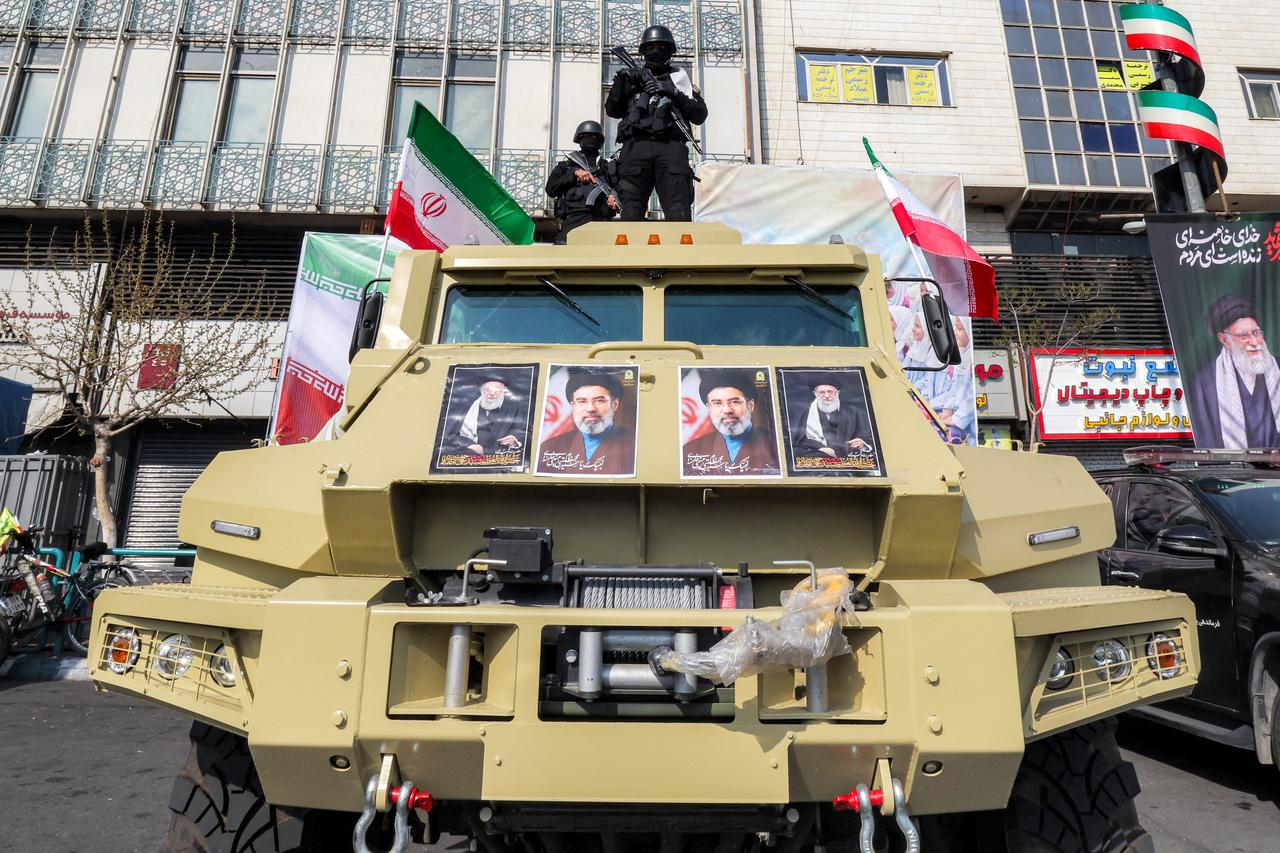 Security forces deploy to guard a rally in support of Iran's new Supreme Leader Mojtaba Khamenei at Enghelab Square in central Tehran, Iran, March 9, 2026. (AFP Photo)