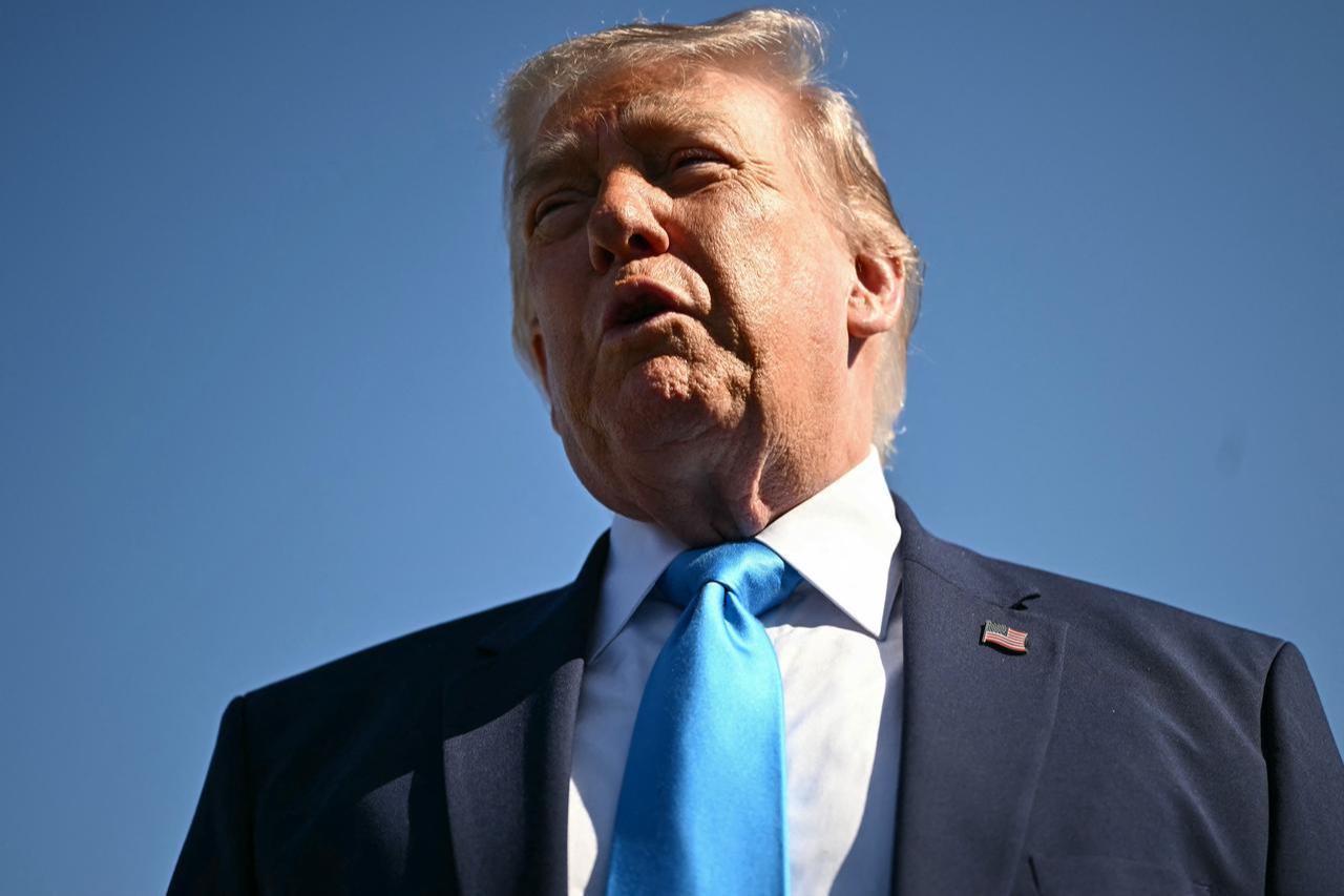 US President Donald Trump speaks to reporters before boarding Air Force One at Joint Base Andrews, Maryland on May 20, 2026. (AFP Photo)
