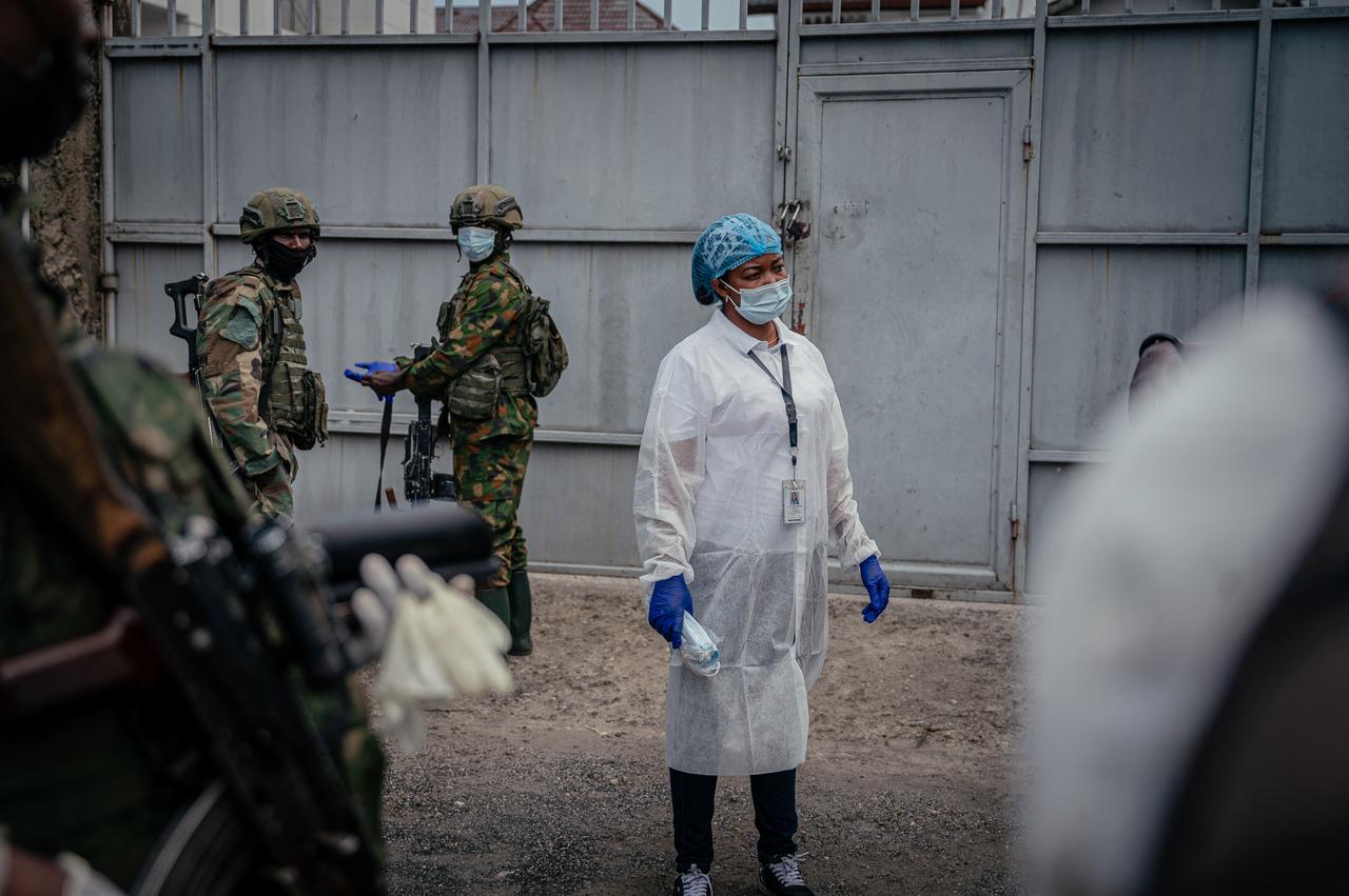 A health worker monitors visitors arriving at the Rodolphe Mérieux Laboratory, National Biomedical Research Institute (INRB) in Goma, on May 19, 2026. (AFP Photo)