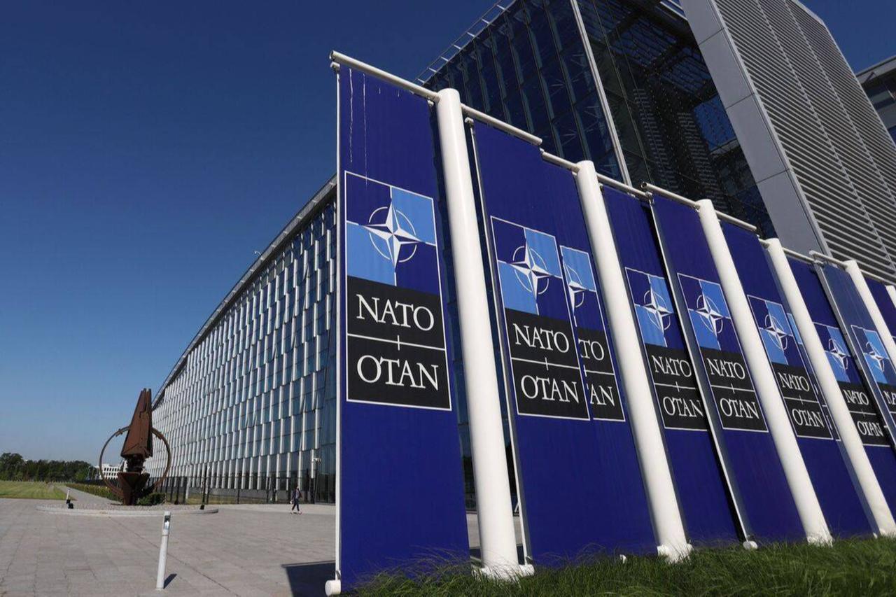A photo taken on June 15, 2022 shows North Atlantic Treaty Organization (NATO) logos at the NATO headquarters in Brussels, Belgium. (AFP Photo)