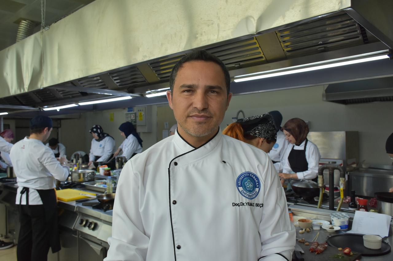 Assoc. Prof. Dr. Yılmaz Seçim, President of the Türkiye Gastronomy Federation (TUGAFED), poses in a professional kitchen (AA Photo)