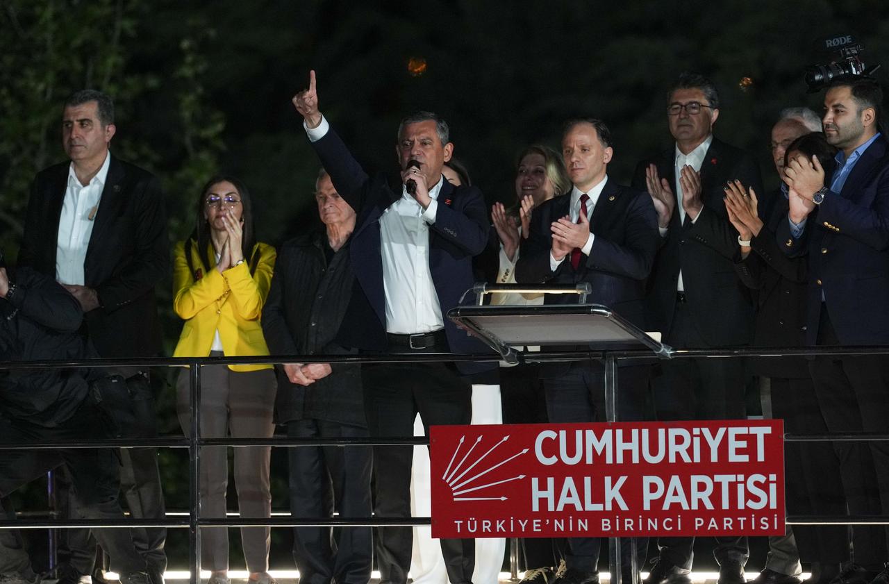 Suspended Republican People's Party Chairman (CHP) Ozgur Ozel addresses supporters gathered outside the CHP headquarters from atop a bus, after being temporarily removed from his position in Ankara, May 21, 2026. (AA Photo)