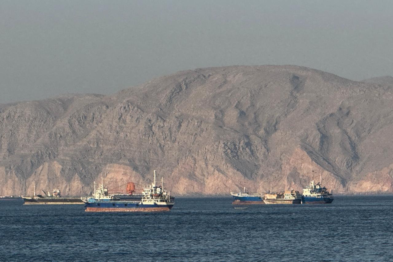 Vessels are seen anchored in the Strait of Hormuz, off the port city of Khasab on Oman’s northern Musandam Peninsula on May 17, 2026. (AFP Photo)