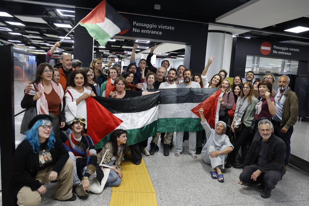 Activists of the Global Summed Flotilla celebrate with friends and relatives after arriving from Istanbul, Türkiye, at Rome's Fiumicino international airport, Italy, May 21, 2026. (AA Photo)