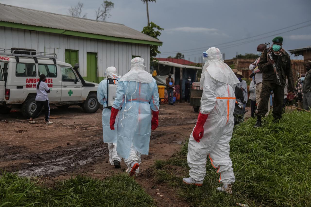 Medical personnel dressed in full protective gear move through a hospital in Rwampara, DR Congo, May 21, 2026. (AFP Photo)