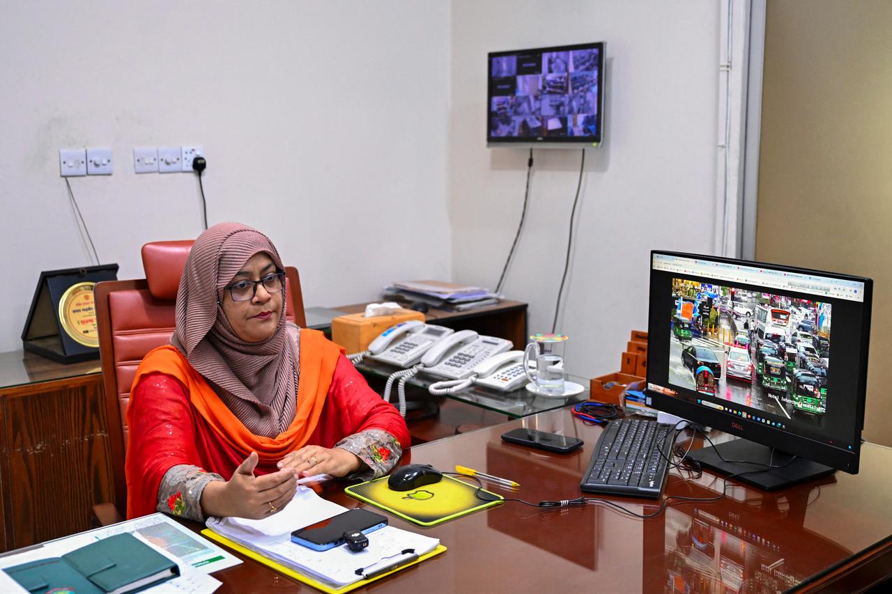 This photograph shows analyst Sharmin Afroze speaking during an interview with AFP at police headquarters in Dhaka, Bangladesh on May 14, 2026 (AFP Photo)