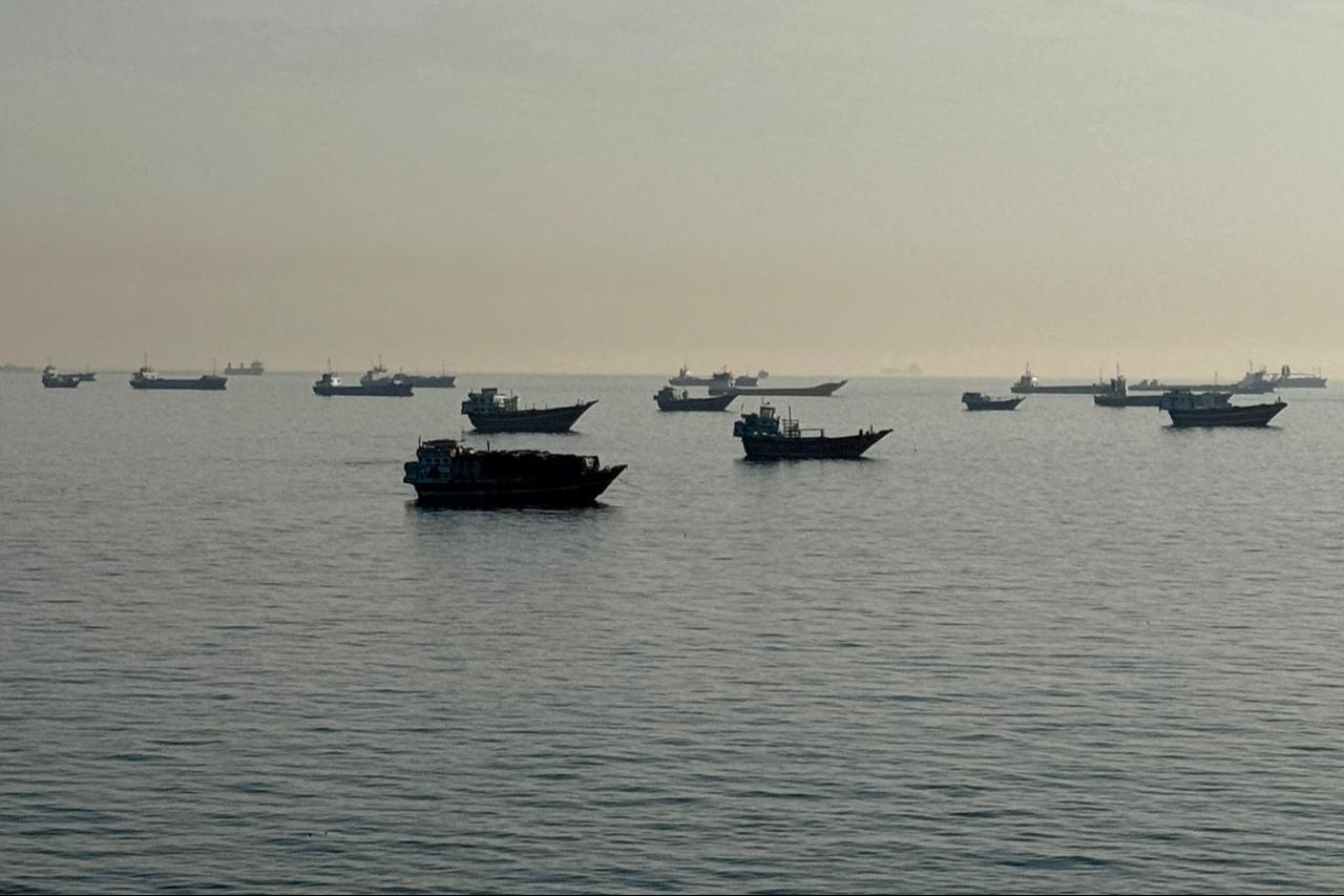 Vessels are seen anchored in the Strait of Hormuz, off the port city of Khasab on Oman’s northern Musandam Peninsula on May 17, 2026. (AFP Photo)