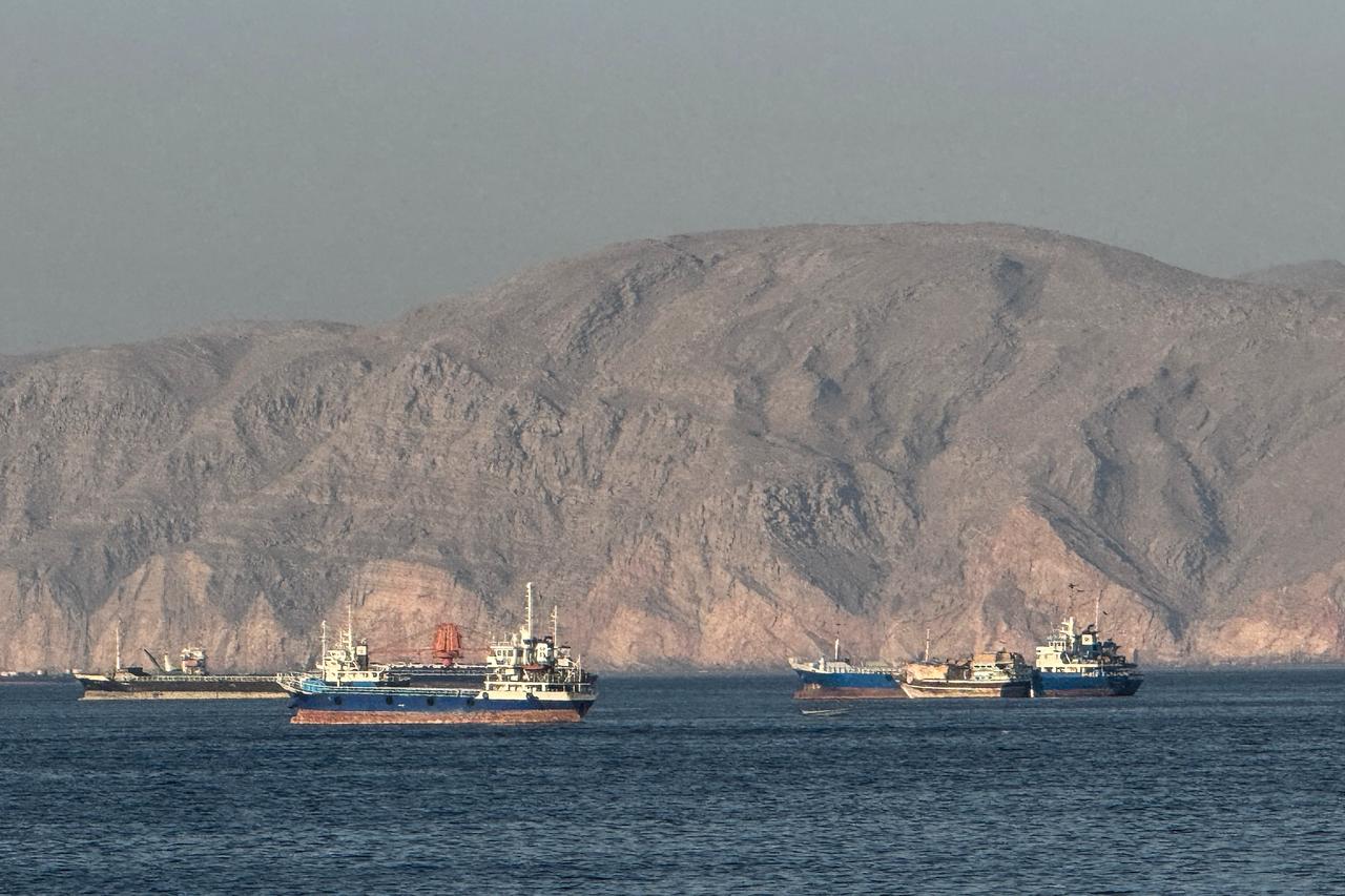 Vessels are seen anchored in the Strait of Hormuz, off the port city of Khasab on Oman’s northern Musandam Peninsula on May 17, 2026. (AFP Photo)