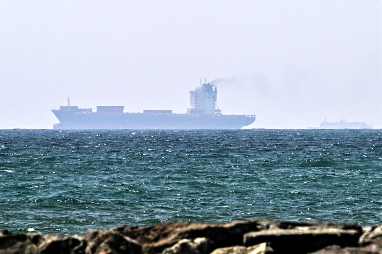 Vessels are seen off the coast of Sharjah in the United Arab Emirates on May 21, 2026. (AFP Photo)