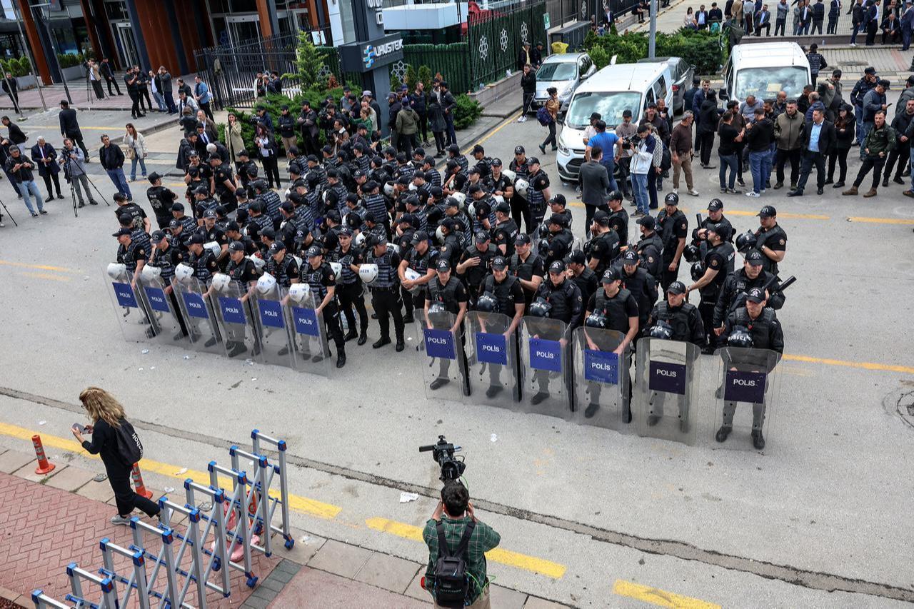 Turkish riot police stand guard outside the Republican People's Party (CHP) headquarters in Ankara, on May 24, 2026. (AFP Photo)