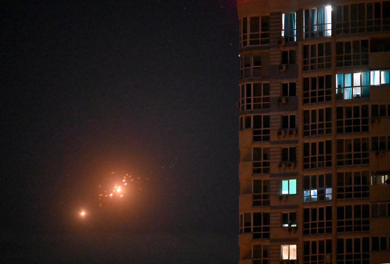 This photo shows Ukrainian air defense firing at Russian drones above Kyiv during a Russian drone and missile strike on the Ukrainian capital on May 24, 2026. (AFP Photo)
