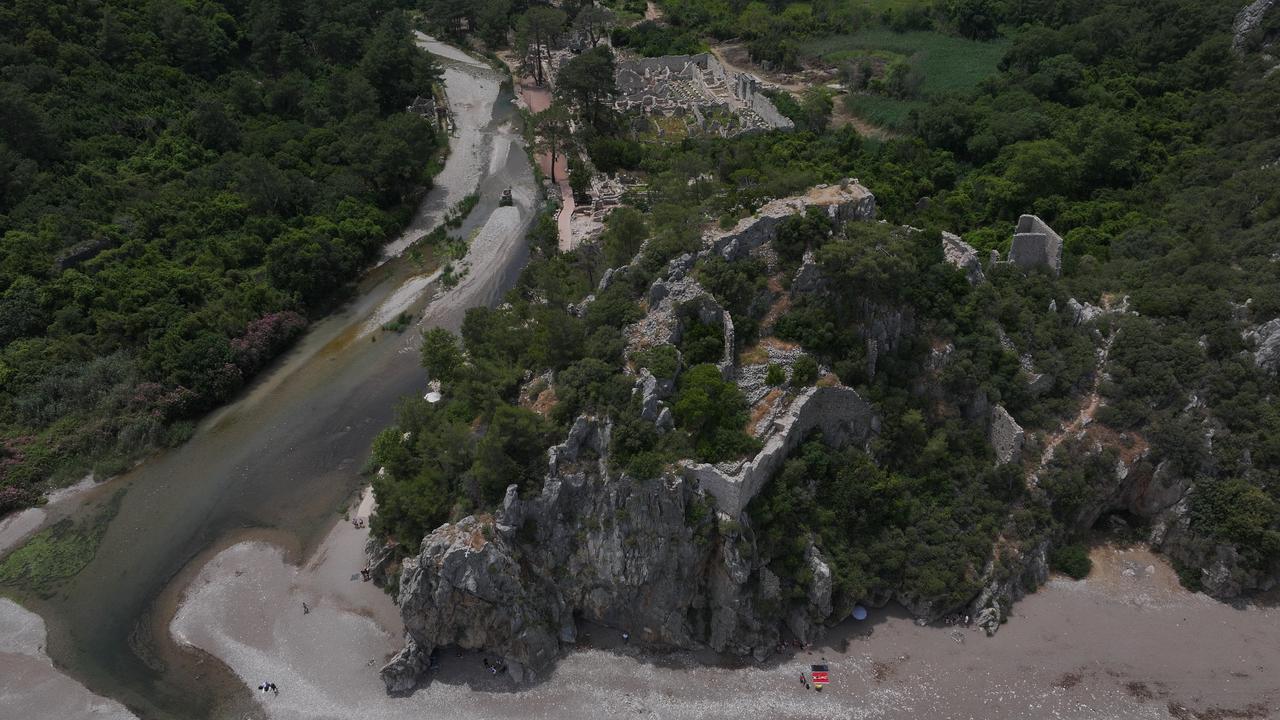 An aerial view of an archeological site, where a monumental tomb believed to belong to an aristocratic woman is unearthed, during excavations at Olympos, one of the most important cities of the Lycian civilization, in the Kumluca district of Antalya, Türkiye, May 19, 2026. (AA Photo)