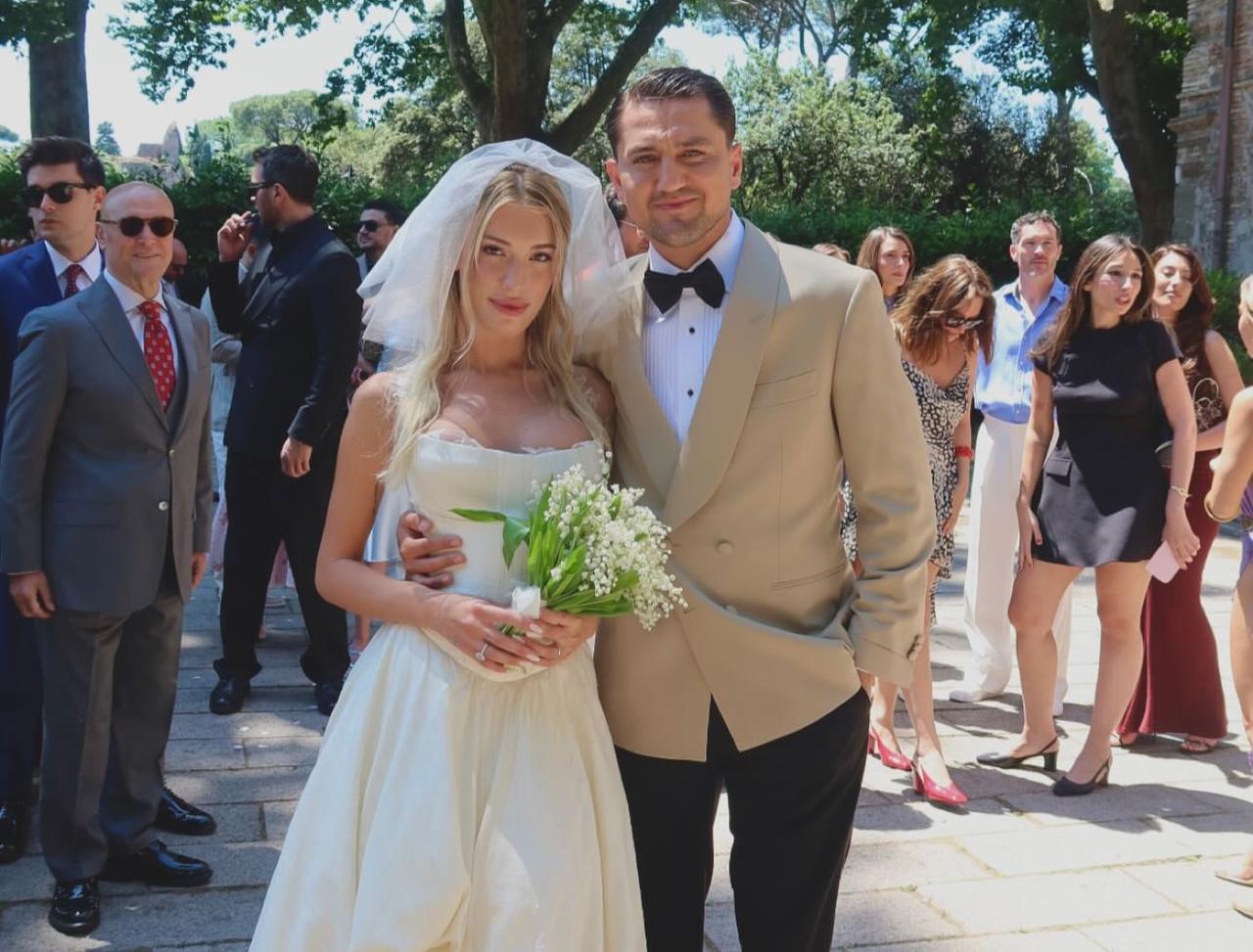 Cengiz Under and Bilge Yenigul pose after their wedding ceremony in Rome, Italy, May 24, 2026. (Photo via Instagram/@bilgeyenigul)