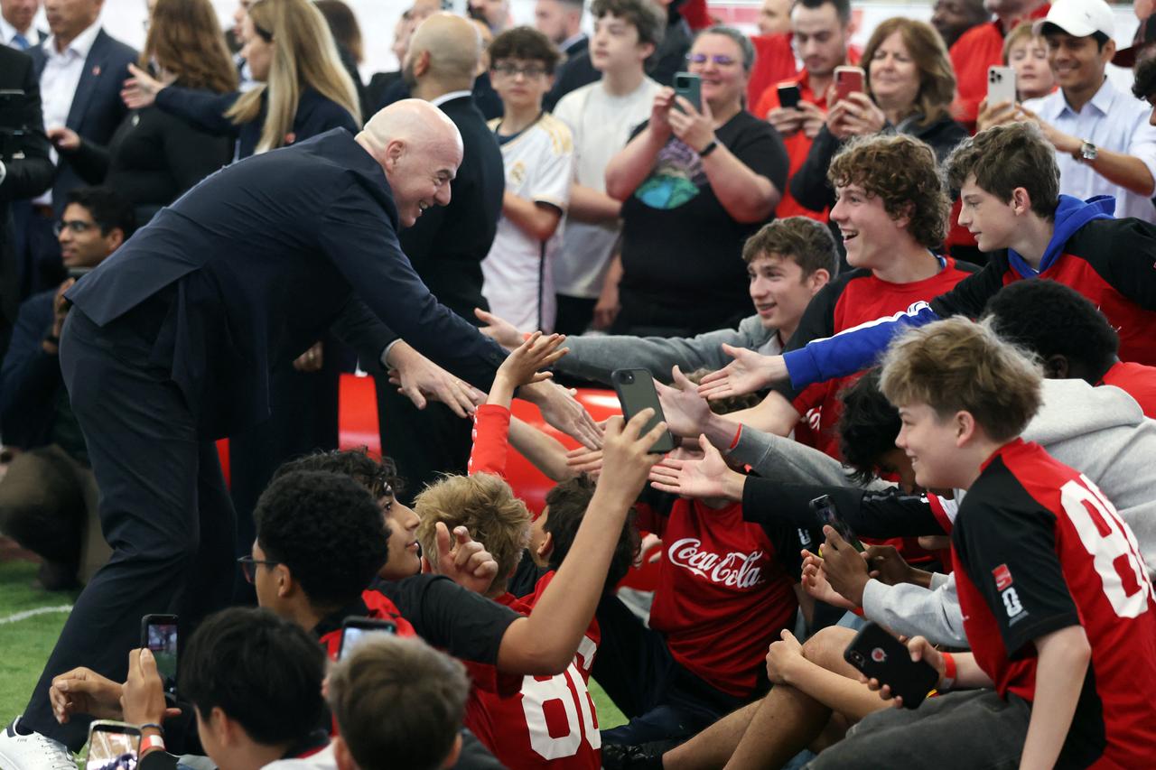 FIFA President Giovanni Infantino greets local youth football players Ottawa, Canada, May 24, 2026. (AFP Photo)