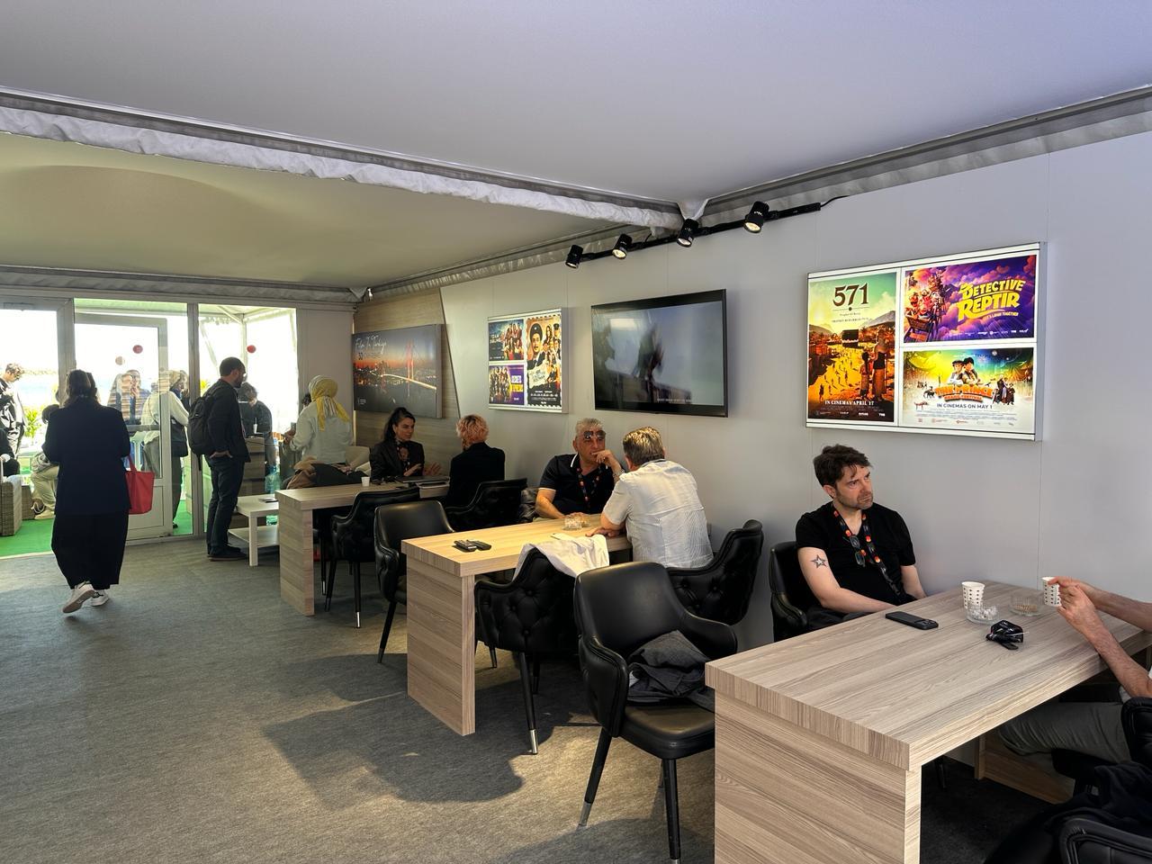 Film industry representatives hold meetings inside the Türkiye Stand during the Cannes Film Festival in Cannes, France. (Photo via Culture and Tourism Ministry)