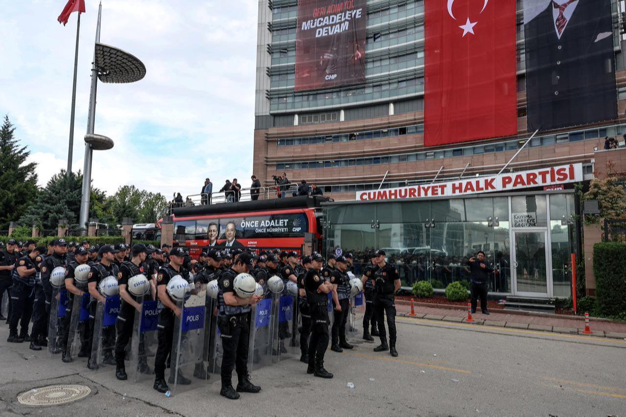 Turkish riot police stand guard outside the Republican People's Party (CHP) headquarters in Ankara, on May 24, 2026. (AFP Photo)