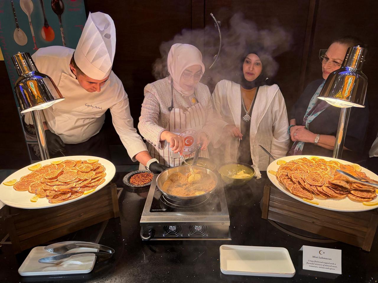 Chefs prepares lahmacun during a Turkish Cuisine Week event in Kuwait, May 25, 2026. (AA Photo)