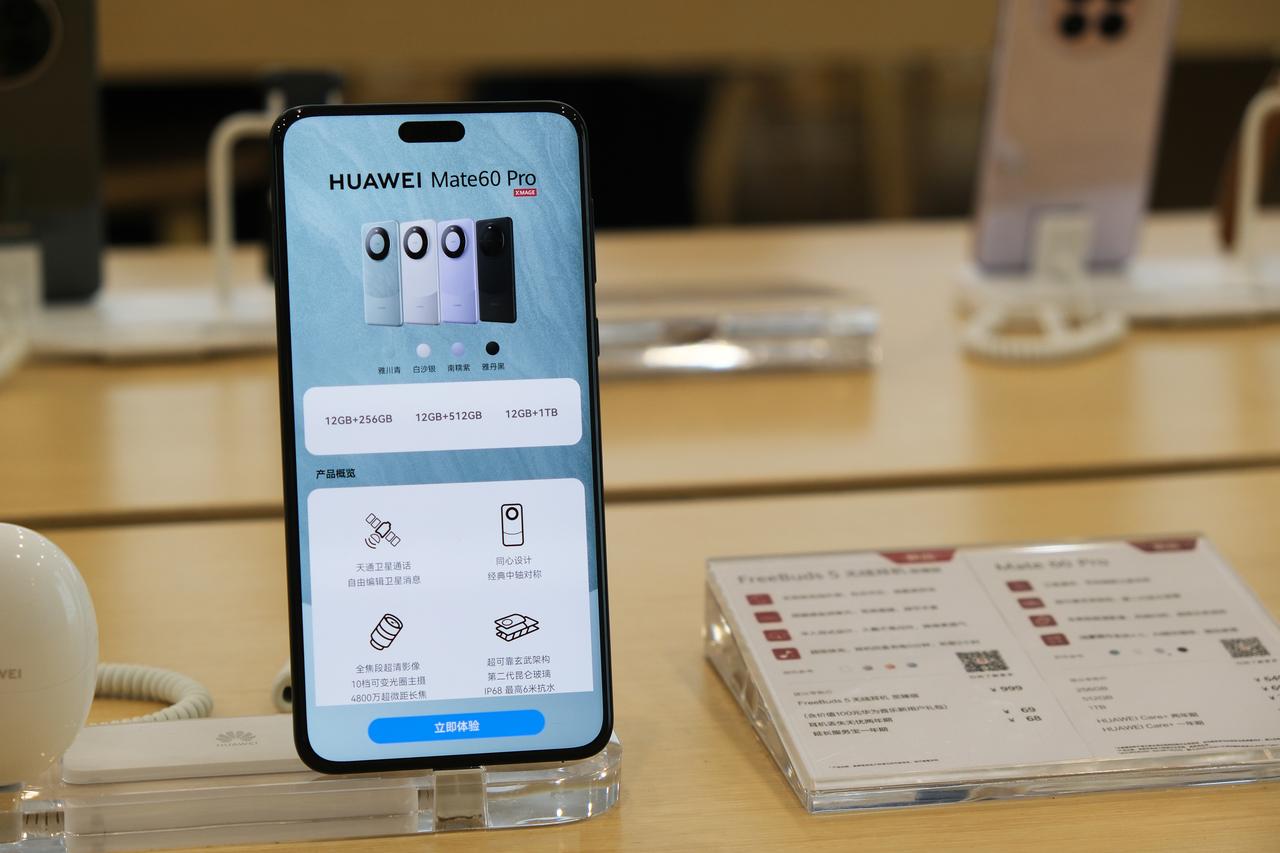 A Huawei Mate60 Pro smartphone is displayed at a retail store in China (Adobe Stock Photo)