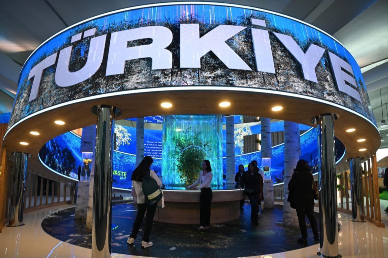 Visitors visit the “Zero Waste” themed country pavilion of the Turkish Directorate of Communications as part of the 29th Conference of the Parties (COP29) to the United Nations Framework Convention on Climate Change (UNFCCC) in Baku, Azerbaijan, November 12, 2024. (AA Photo)