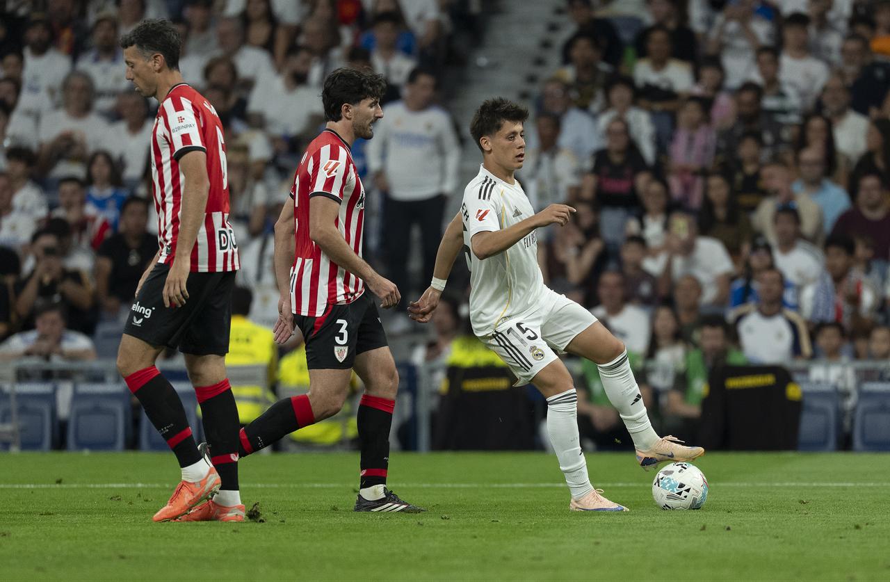 Arda Guler (R) of Real Madrid in action against Dani Vivian (3) of Athletic Club Bilbao during La Liga match between Real Madrid and Athletic Club Bilbao at Bernabeu Stadium in Madrid, Spain, May 23, 2026. (AA Photo)