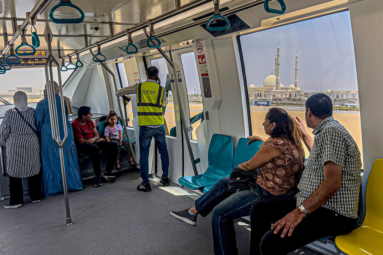 Passengers ride aboard the new Cairo Monorail. (AFP Photo)