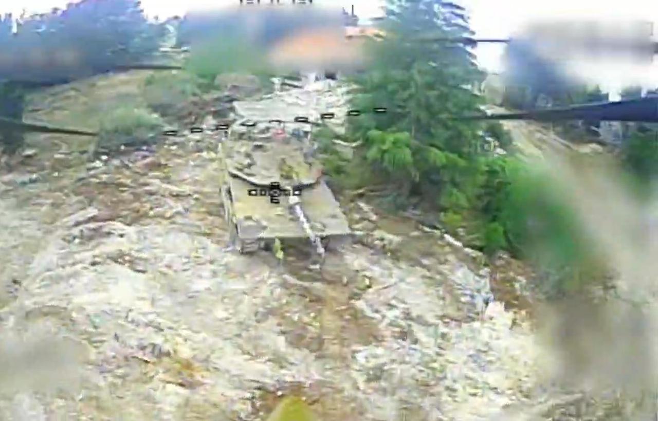 The photo shows an Israeli army Merkava tank from Hezbollah's FPV drone's POV in southern Lebanon at an unspecified location and time. (Photo via Telegram)