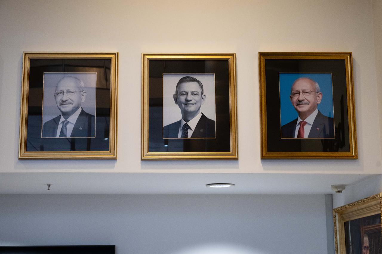 Portraits of reinstated CHP Chairman Kemal Kilicdaroglu and former chairman Ozgur Ozel are displayed at CHP headquarters in Ankara, Türkiye, on May 25, 2026, with Kilicdaroglu’s portrait appearing both as former and current party leader following his reinstatement. (AA Photo)