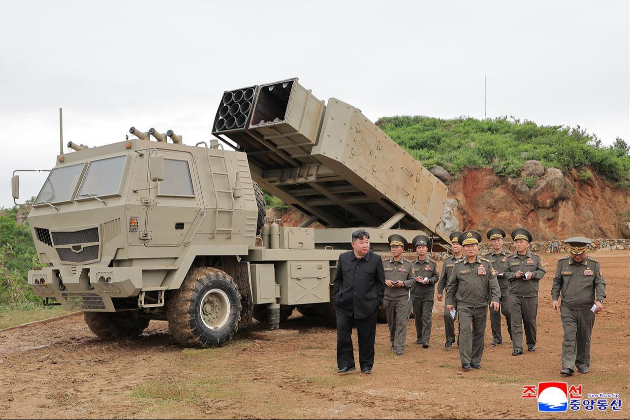 This picture taken on May 26, 2026 and released by North Korea's official Korean Central News Agency (KCNA) on May 27, 2026 shows North Korean leader Kim Jong Un inspecting tests of newly-developed lightweight multi-purpose missile launching system and multiple tactical cruise missile weapon system at an undisclosed location in North Korea. (Photo by KCNA VIA KNS/HO/AFP)