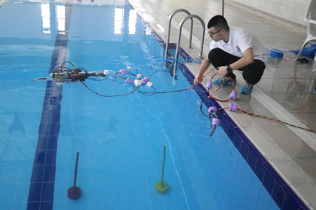 The vehicle, which can be operated autonomously or via remote control, is capable of diving to depths of up to 60 meters, classifying objects and collecting them using robotic arms. Adana, Türkiye, May 27, 2026. (AA Photo)