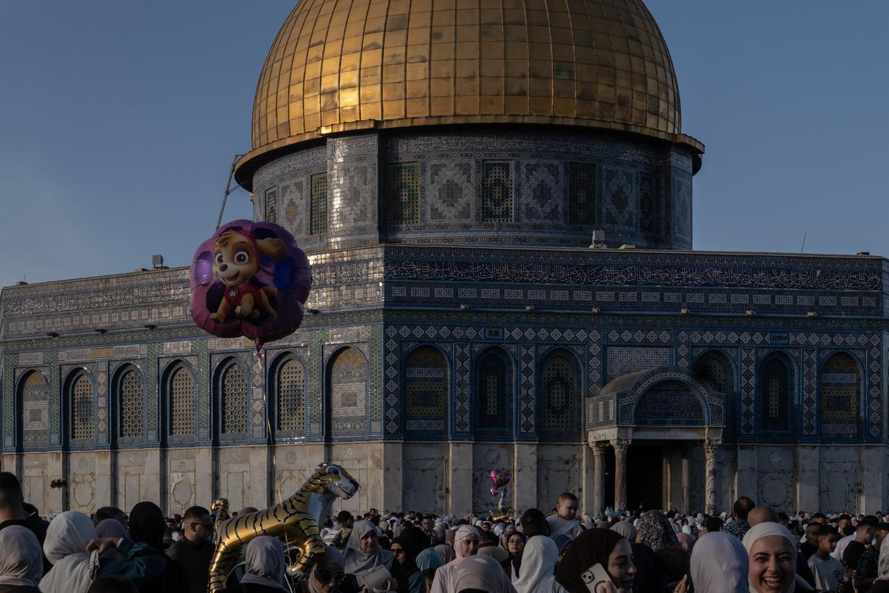 Muslim worshippers flock to the Al-Aqsa Mosque, located in the Old City of East Jerusalem, to perform the Eid al-Adha (Feast of Sacrifice) prayer on May 27, 2026. (AA Photo)