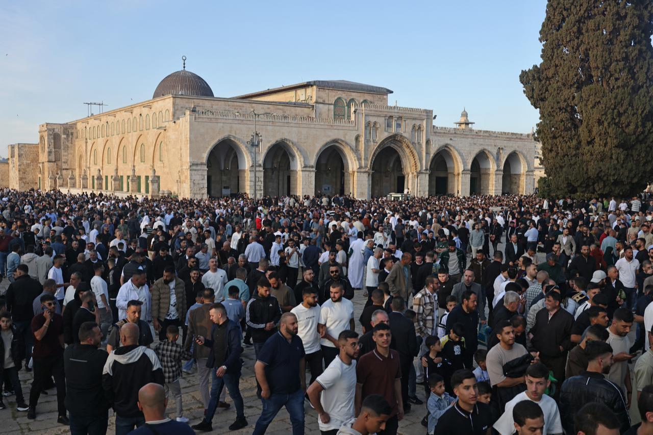 Muslim devotees gather at the Al-Aqsa Mosque compound in Jerusalem on May 27, 2026, to mark the start of Eid al-Adha, the Feast of Sacrifice. (AFP Photo)