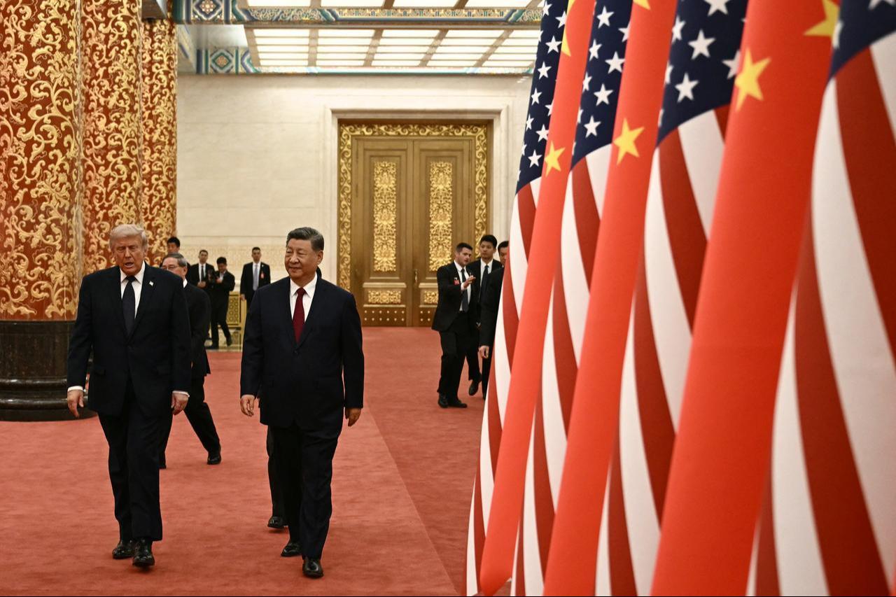 China's President Xi Jinping (R) and US President Donald Trump arrive to attend a state banquet at the Great Hall of the People in Beijing on May 14, 2026. (AFP Photo)