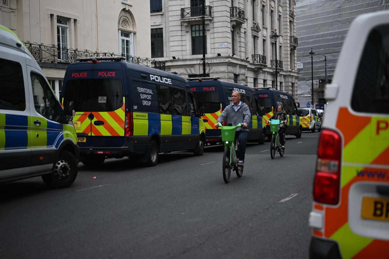 Police take security measures as large crowds march through the streets in London, United Kingdom on May 16, 2026. (AA Photo)