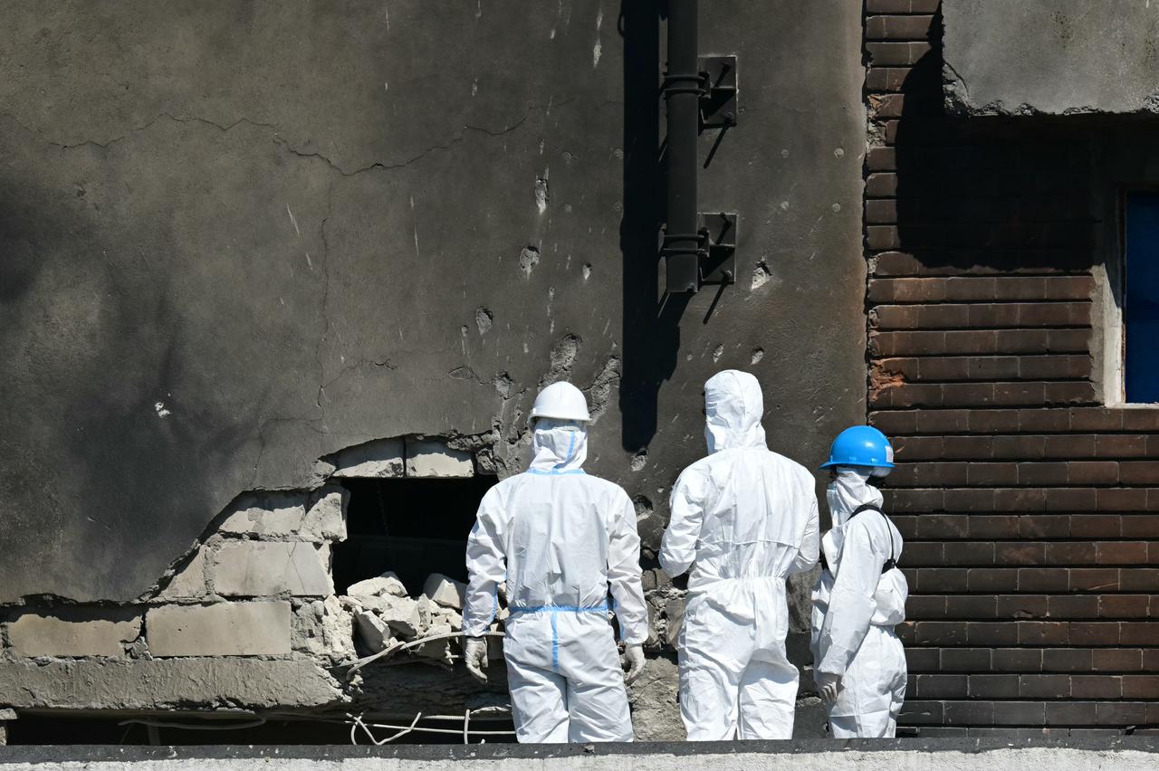 Forensic investigators examine the location of impact after a Russian drone struck an apartment building in Galati, eastern Romania, accessed on May 29, 2026. (AFP Photo)