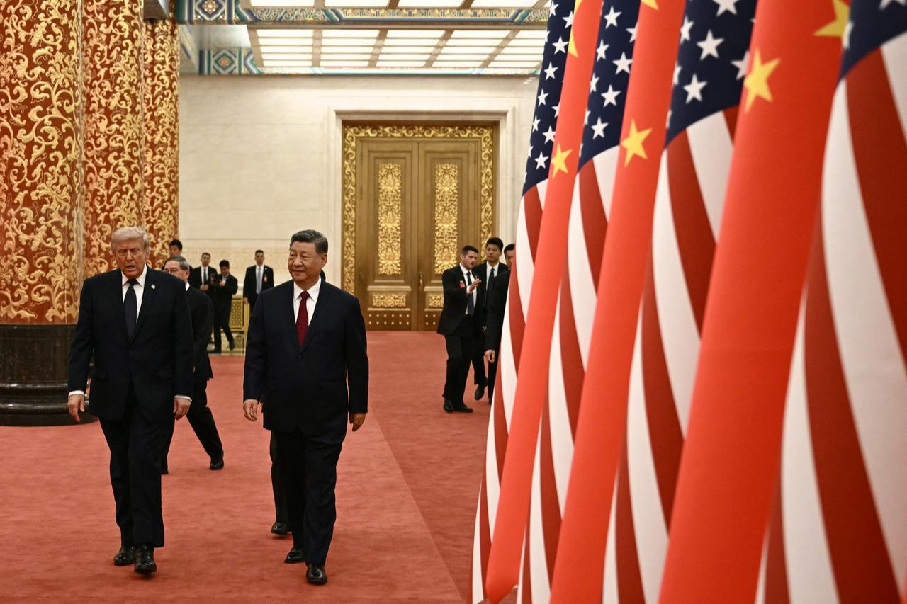 China's President Xi Jinping (R) and US President Donald Trump arrive to attend a state banquet at the Great Hall of the People in Beijing on May 14, 2026. (AFP Photo)
