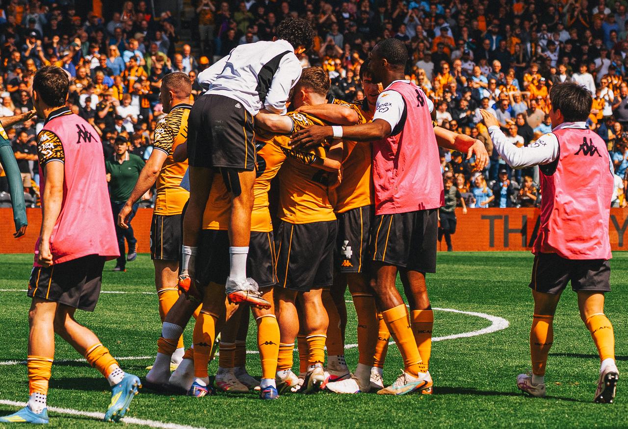 Hull City players celebrate on the pitch after a 2-1 win over Norwich City on the final day of the season, securing a Championship play-off spot in Hull, England, May 2, 2026. (Photo via X/@HullCity)