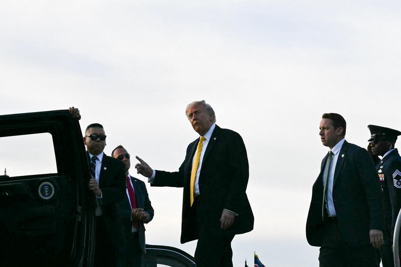 US President Donald Trump steps off Air Force One at Miami International Airport in Miami, May 2, 2026. (AFP Photo)