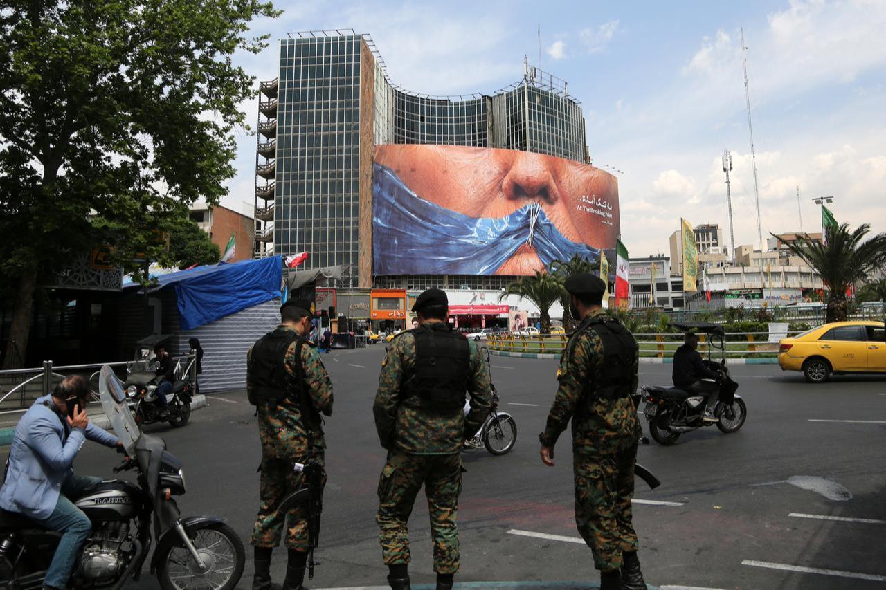 A giant banner depicting the Strait of Hormuz is displayed at Vali-e Asr Square, featuring the phrase “At the breaking point" in Tehran, Iran, May 2, 2026. (AA Photo)