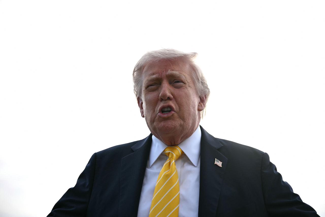 US President Donald Trump speaks with reporters at Palm Beach International Airport in West Palm Beach, Florida, May 2, 2026, before boarding Air Force One. (AFP Photo)